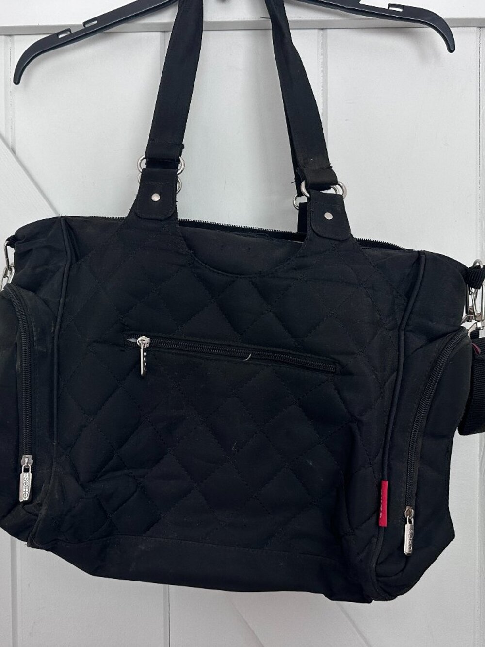SOHO black quilted shoulder bag with multiple zippered pockets